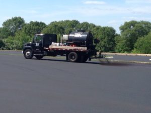 101 Sealcoat Spraying Sealer From Truck