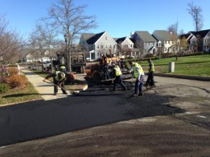 101 Overlay Big Paver With Crew On Corner