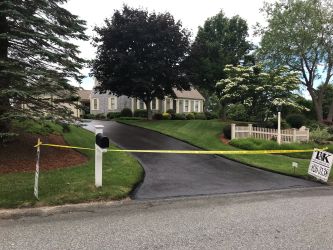 Another T&K Asphalt satisfied customer, Cape On Hill With Yellow Shutters And Matching Dogwood Residential Sealcoating by T&K Asphalt Services