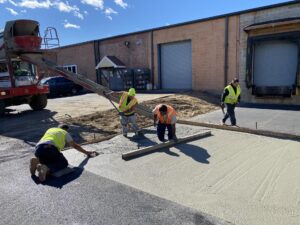 Guys Working On Concrete Pour