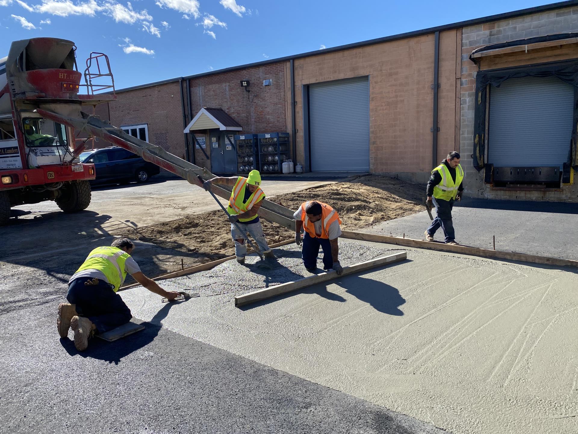 Guys Working On Concrete Pour Guys Working On Concrete Pour