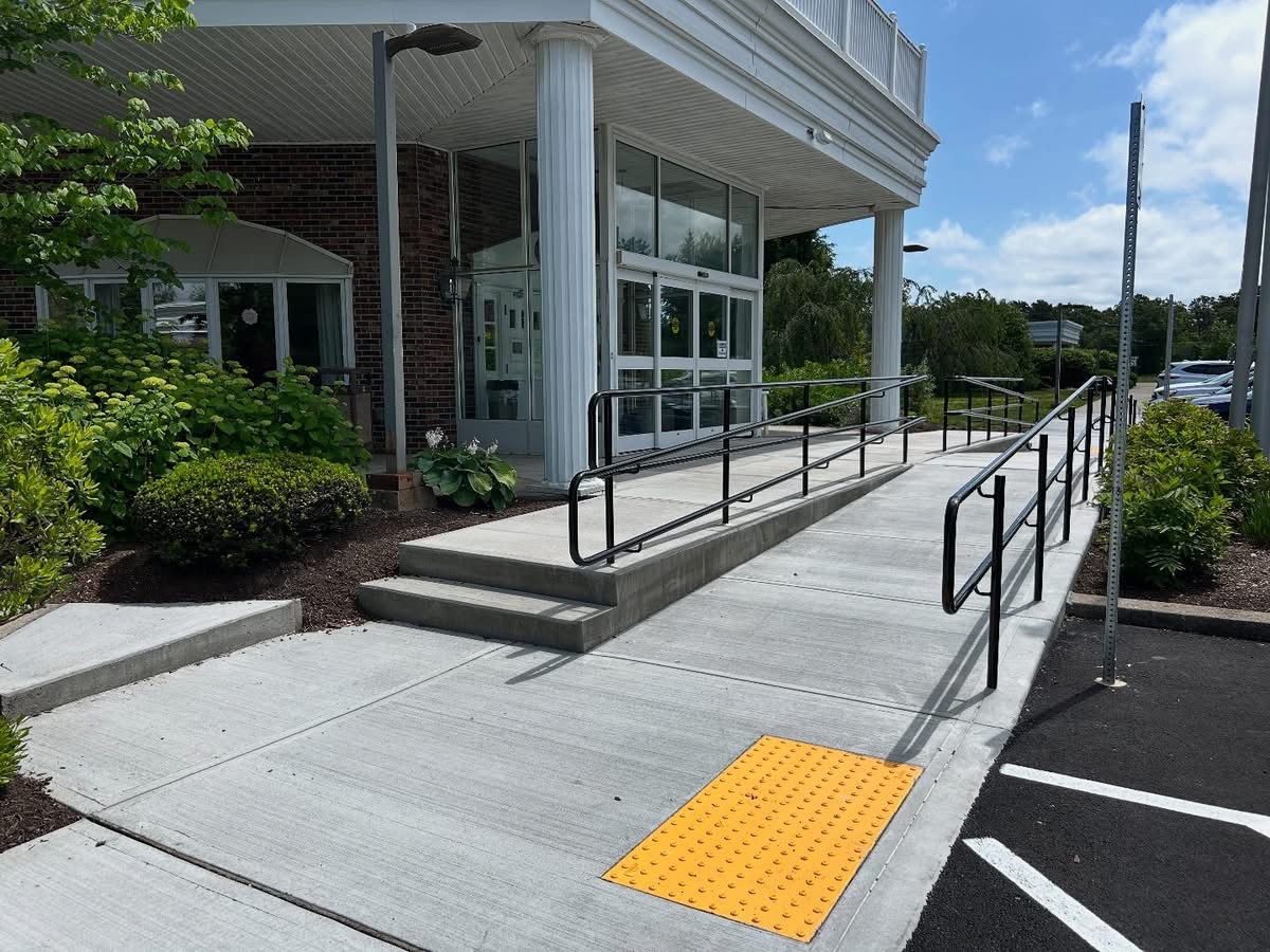 T & K Asphalt Services, Inc. Paving, Asphalt & Concrete Services- serving commercial customers throughout New England ADA Compliant concrete ramp in Bourne MA constructed by T&K Asphalt Concrete Division