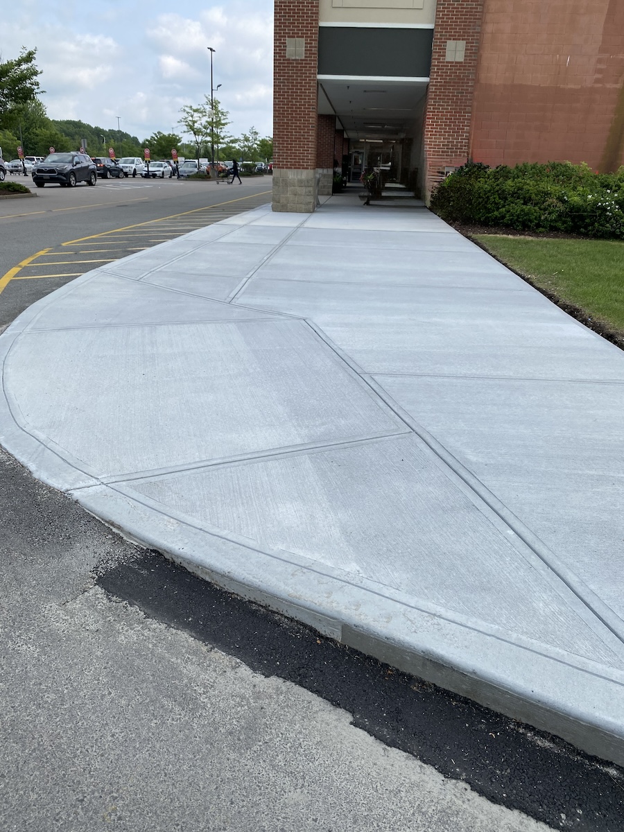 ADA Compliant Concrete Ramps Serving Commercial Customers Throughout New England ADA Compliant Concrete Ramp built by T&K Asphalt- commercial concrete contractors serving New England